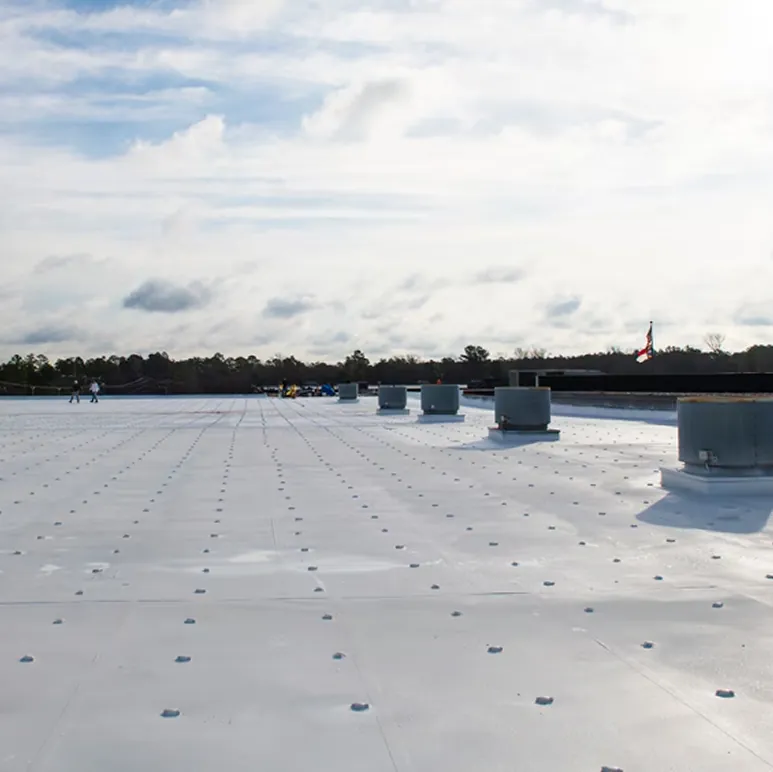 Weathered single-ply commercial roof that is a candidate for restoration